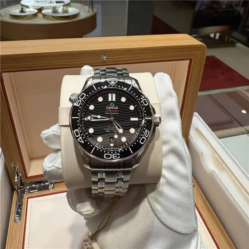 Omega De Ville automatic men's watch with blue dial and stainless steel bracelet